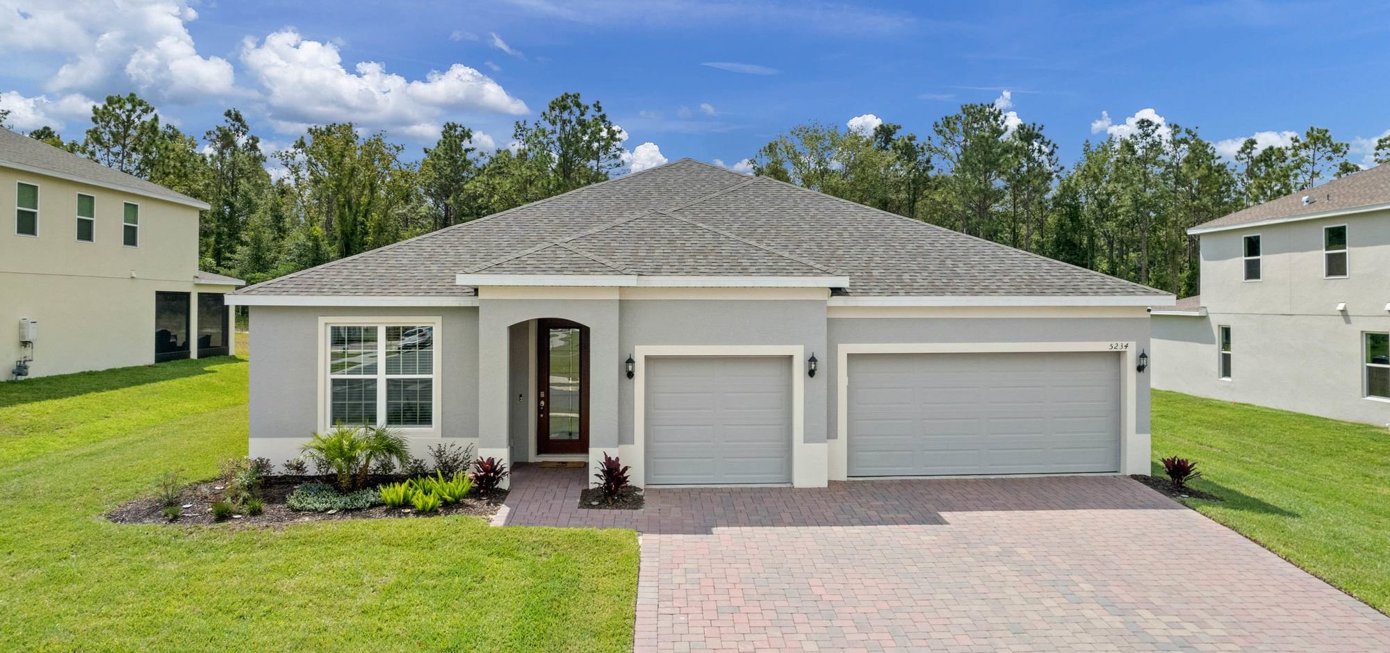 front of one story home with light blue paint